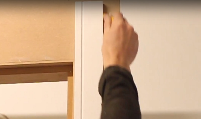 Marking out the outline of architrave